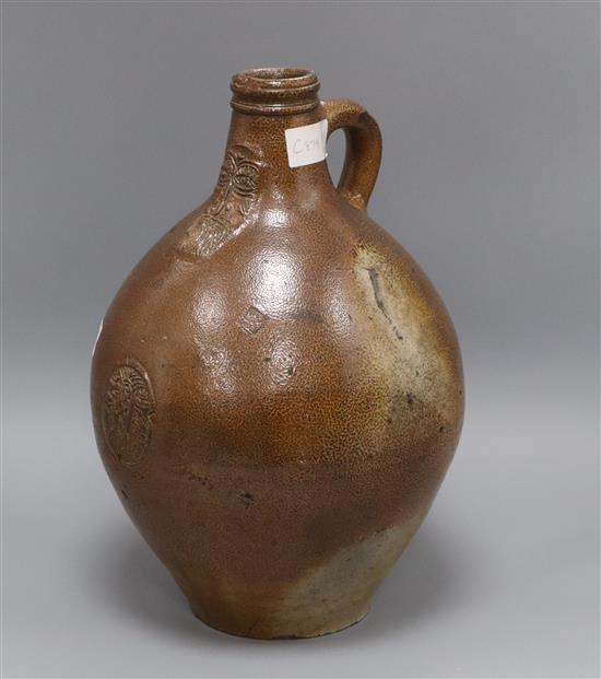 A 17th / 18th century Bellamine pottery flagon height 38cm